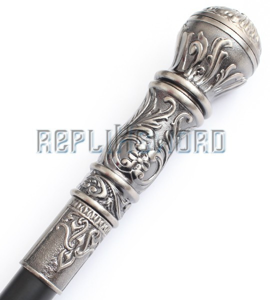 Canne pommeau en argent décor feuillages - SA - Antiquités